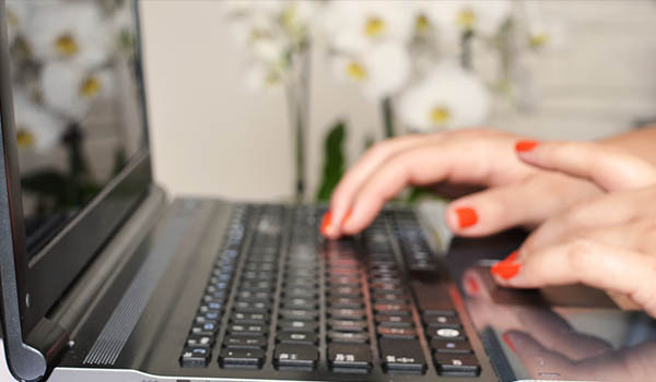 woman typing-resource thumbg