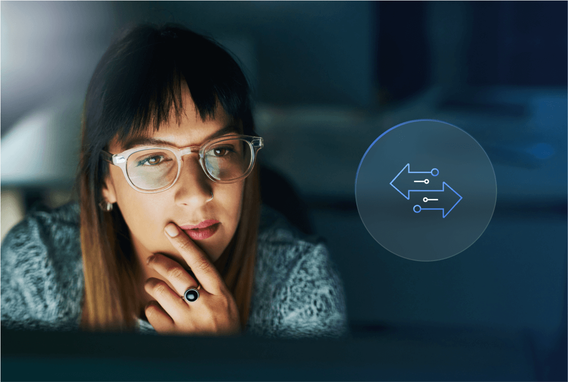 Woman researching on her computer; icons with two arrows pointing in different directions representing data process